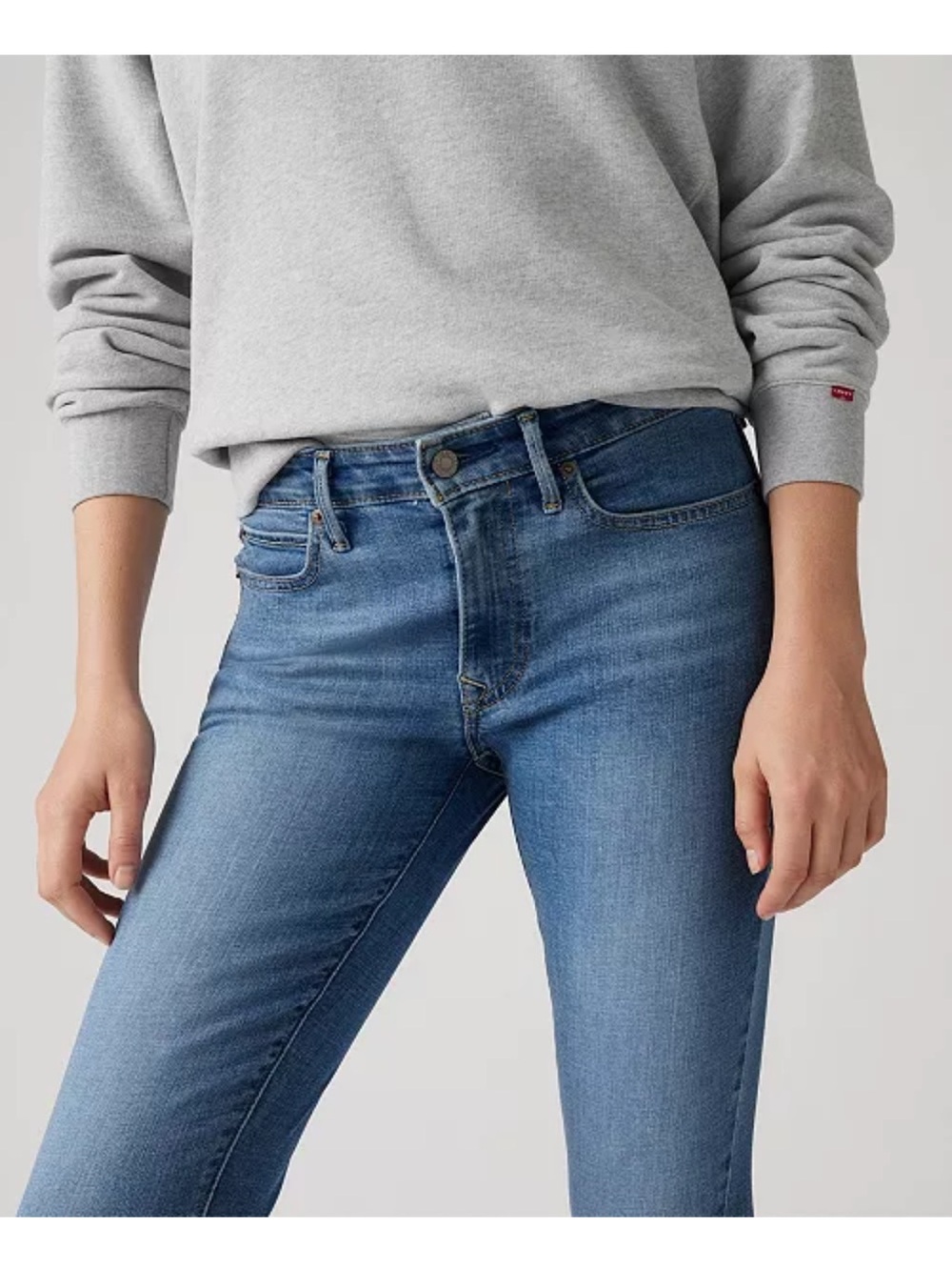 Offers Welcome Levi's Women's Medium Wash Mid-Rise Jeans